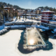 Das Hotel Hochschober inmitten verschneiter Pisten und Wälder auf der Turracher Höhe