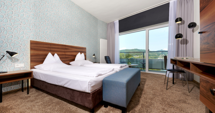 Hotelzimmer mit Ausblick auf den wunderschönen Wörthersee machen Vorfreude auf mehr.