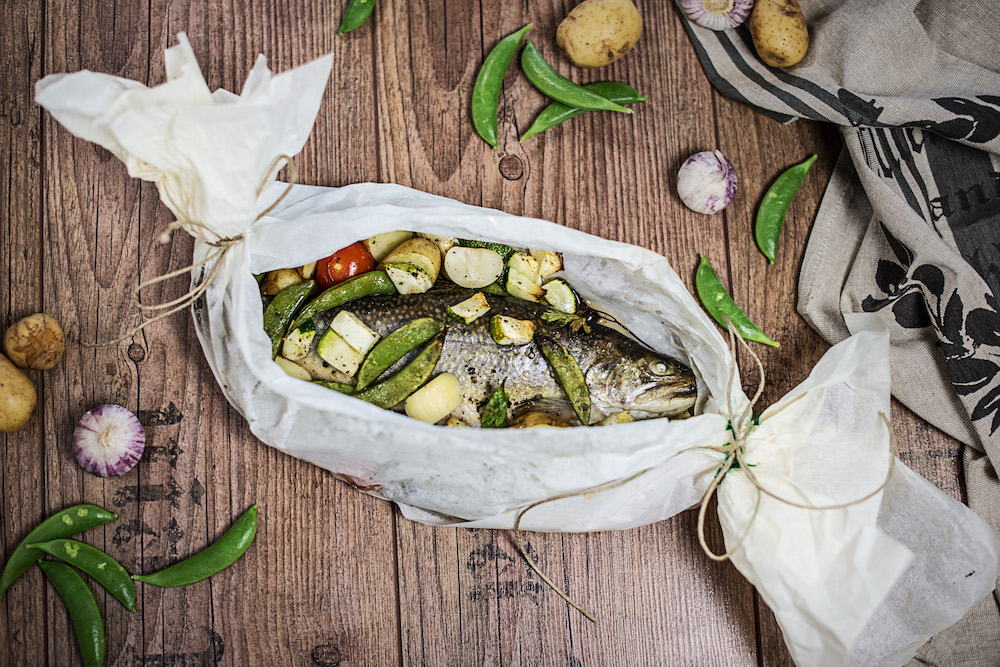 Was gibt es Schöneres als Fisch-Köstlichkeiten am Kirchenplatz in Feld am See zu genießen?